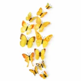 Gule 3D sommerfugle vægdekoration sæt med 12 stk i forskellige størrelser på lys baggrund