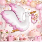 Stork folieballon med baby pige som babyshower dekoration med lyserød festpynt og dessertbord