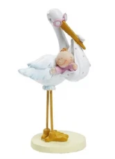 Barnedåbspynt stork med baby pige 11 cm i lyserød og hvid på hvid baggrund – bordpynt til barnedåb og baby shower