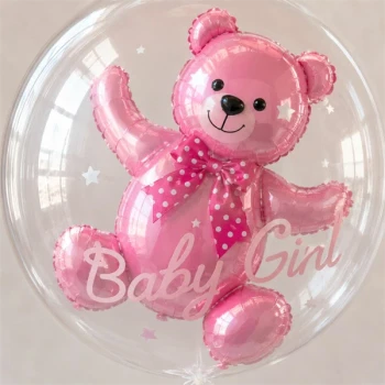 Close-up af transparent ballon med lyserød latex ballonbamse indeni til pige babyshower, barnedåb og fejring af en nyfødt pige.