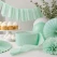 Crepepapir mint grøn brugt til guirlande og festpynt på bord til fødselsdag eller baby shower