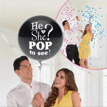 Gender reveal ballon på 60 cm med teksten “He or She Pop to see” fyldt med blå eller pink konfetti