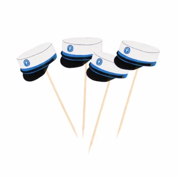 Kagetoppe formet som studenterhuer i mørk blå på træpinde til kagepynt