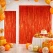 Orange glimmerforhæng 100x240 cm brugt som fest baggrund med balloner, kagebord og photo booth dekoration