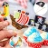 Pirat kagepynt cupcake toppers i brug med papegøje og piratskib på cupcakes til børnefødselsdag